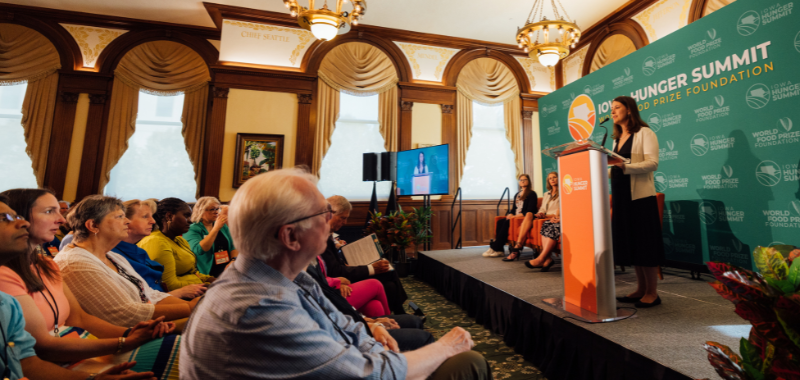 Women speaking at conference
